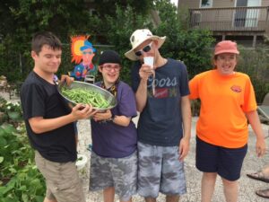 Extend-A-Family Kingston participate in the organization's garden project
